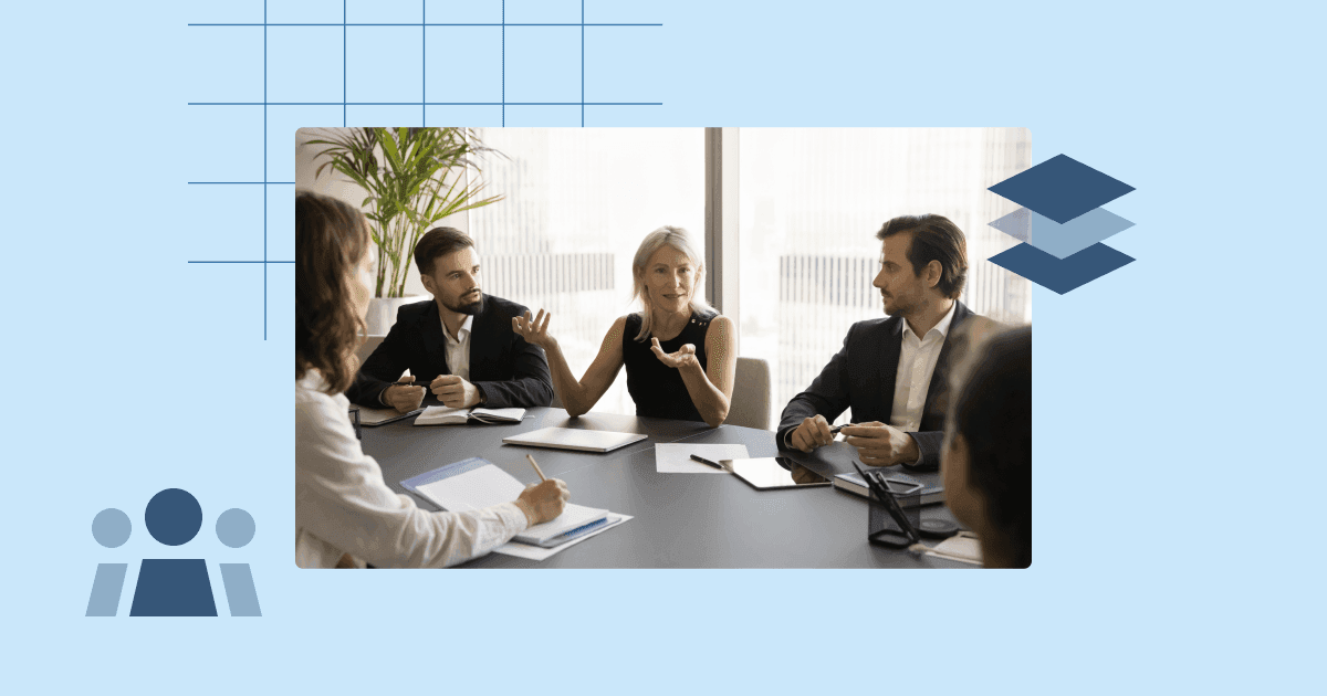 Board of directors meeting around a conference table during an executive discussion.