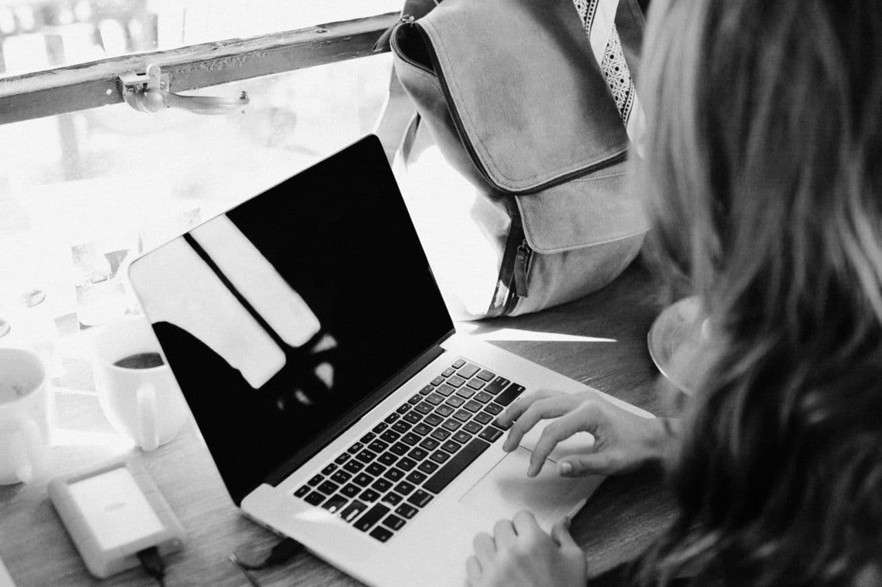 a woman working on her laptop