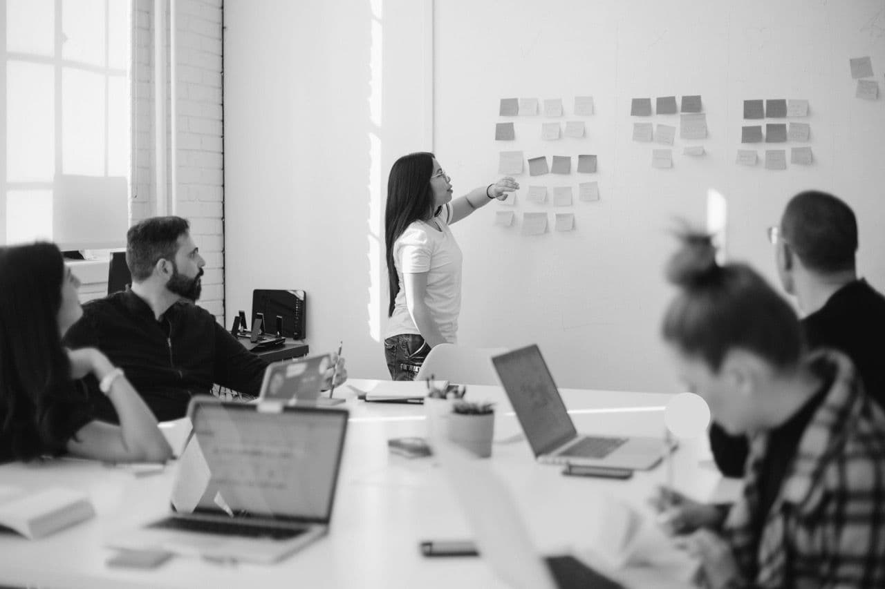 Employees attending a brainstorming meeting